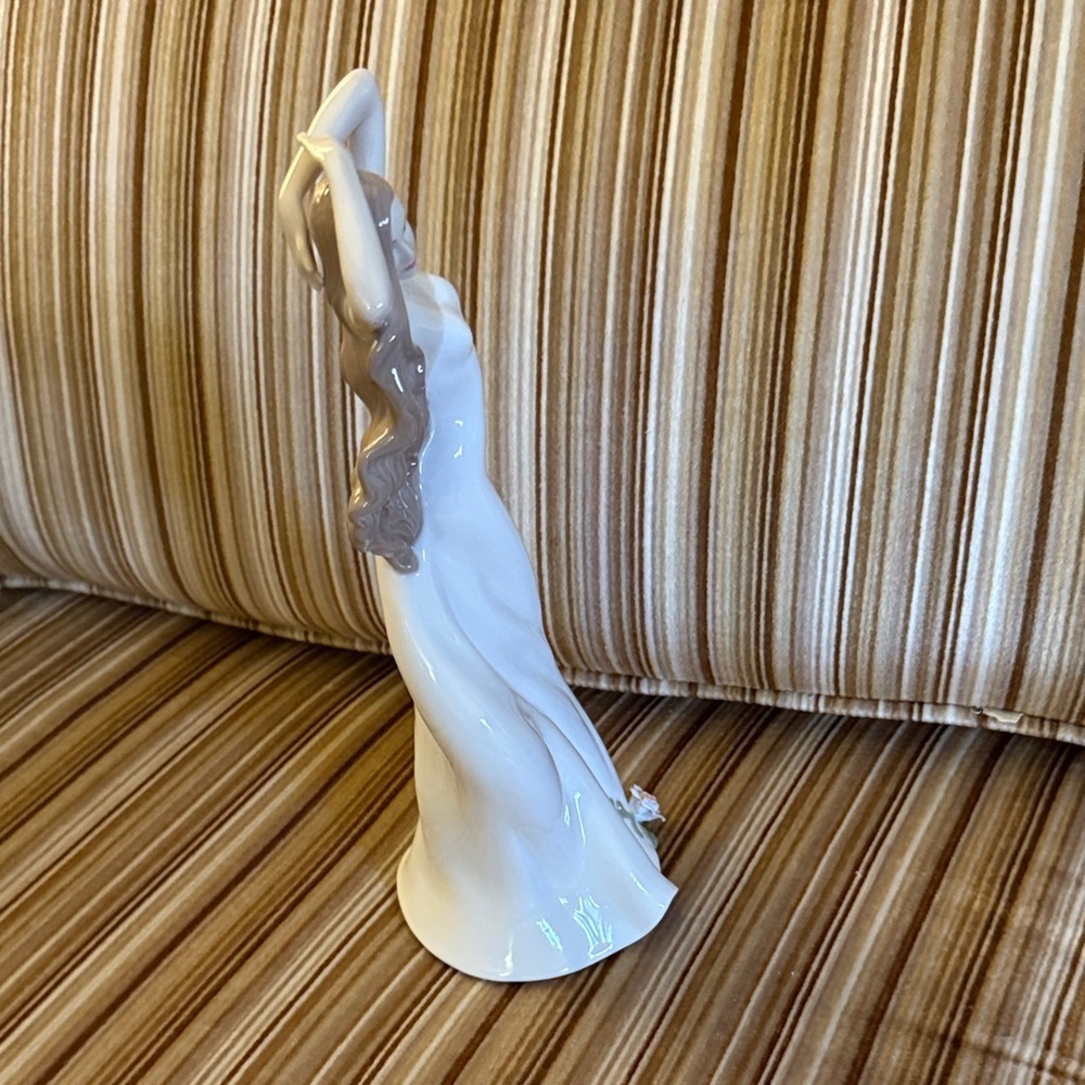 Graceful Cream Sculpture with Floral Accent - Picture 3 of 6